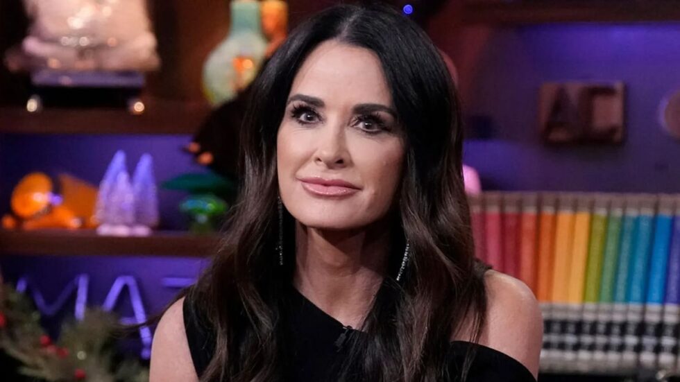 Kyle Richards smirks during an appearance on WWHL