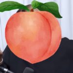 RHOA star NeNe Leakes with her face covered by a peach